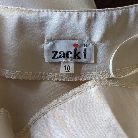 Off the shoulder satin finish top . - Picture 9 of 10